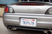 Honda S2000 cu 1.464 km la bord