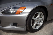 Honda S2000 cu 1.464 km la bord