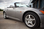 Honda S2000 cu 1.464 km la bord