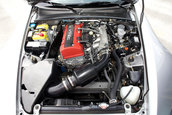 Honda S2000 cu 1.464 km la bord