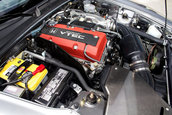 Honda S2000 cu 1.464 km la bord
