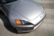 Honda S2000 cu 1.464 km la bord