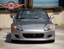 Honda S2000 cu 1.464 km la bord