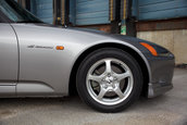 Honda S2000 cu 1.464 km la bord