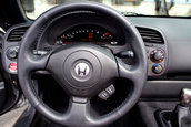 Honda S2000 cu 1.464 km la bord