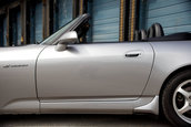 Honda S2000 cu 1.464 km la bord