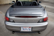 Honda S2000 cu 1.464 km la bord