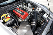 Honda S2000 cu 1.464 km la bord