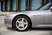 Honda S2000 cu 1.464 km la bord