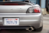 Honda S2000 cu 1.464 km la bord