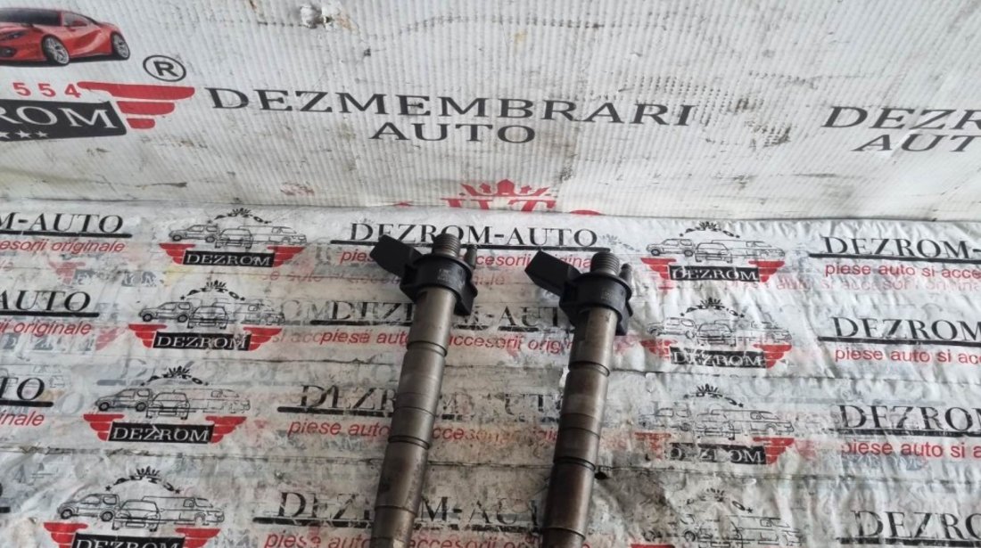 Injector BMW Seria 1 E82 120d cod piesa : 7797877