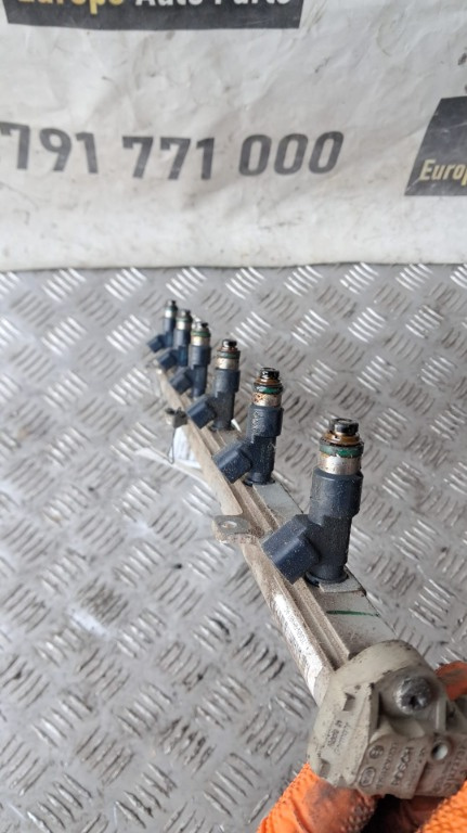 Injector Volvo XC70 an fab. 2009 motor 3.0 B6304T2 cod 7G9N-AC / 062098406