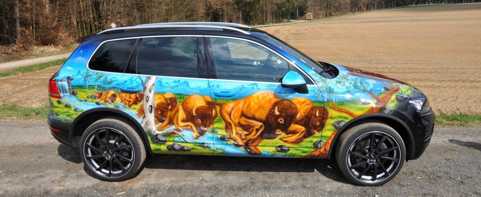 Intai i-a pictat o cireada de bovine, apoi l-a pus la vanzare. Uite cu cat se da acest Touareg V8 Intai i-a pictat o cireada de bovine, apoi l-a pus la vanzare. Uite cu cat se da acest Touareg V8
