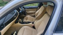 Interior BMW E84 X1 2012 (piele crem, fara incalzi...