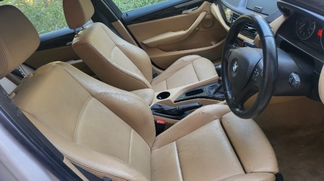 Interior BMW E84 X1 2012 (piele crem, fara incalzire)