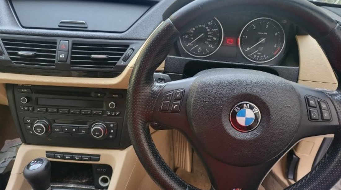 Interior BMW E84 X1 2012 (piele crem, fara incalzire)