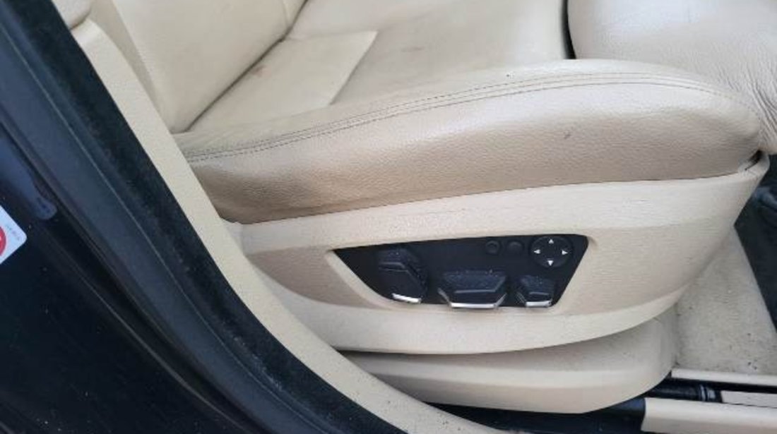 Interior BMW F07 2010 (piele crem, scaune electrice și scaune + banchete încălzite)