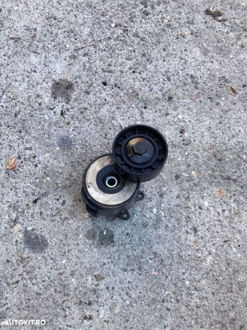 Intinzator curea accesorii Opel Zafira B 1.9CDTi.