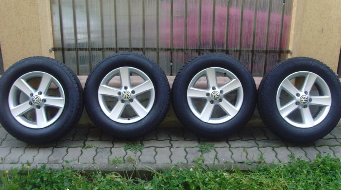 Jante aliaj ca Noi 5x112 pe 16 originale VW Tiguan cu anvelope iarna 215 65 16