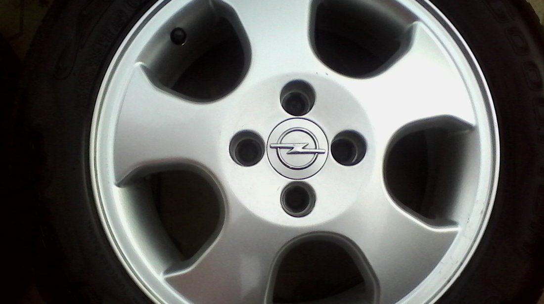 JANTE ALIAJ DE 15 INCH 4X100 PT OPEL ORIGINALE MODEL DEOSEBIT