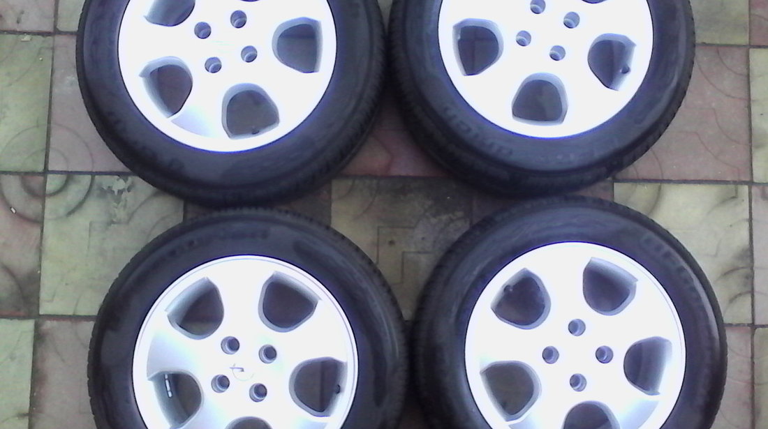 JANTE ALIAJ DE 15 INCH 4X100 PT OPEL ORIGINALE MODEL DEOSEBIT