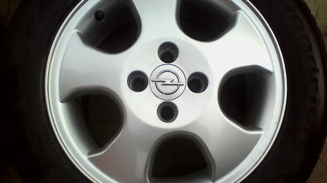 JANTE ALIAJ DE 15 INCH 4X100 PT OPEL ORIGINALE MODEL DEOSEBIT