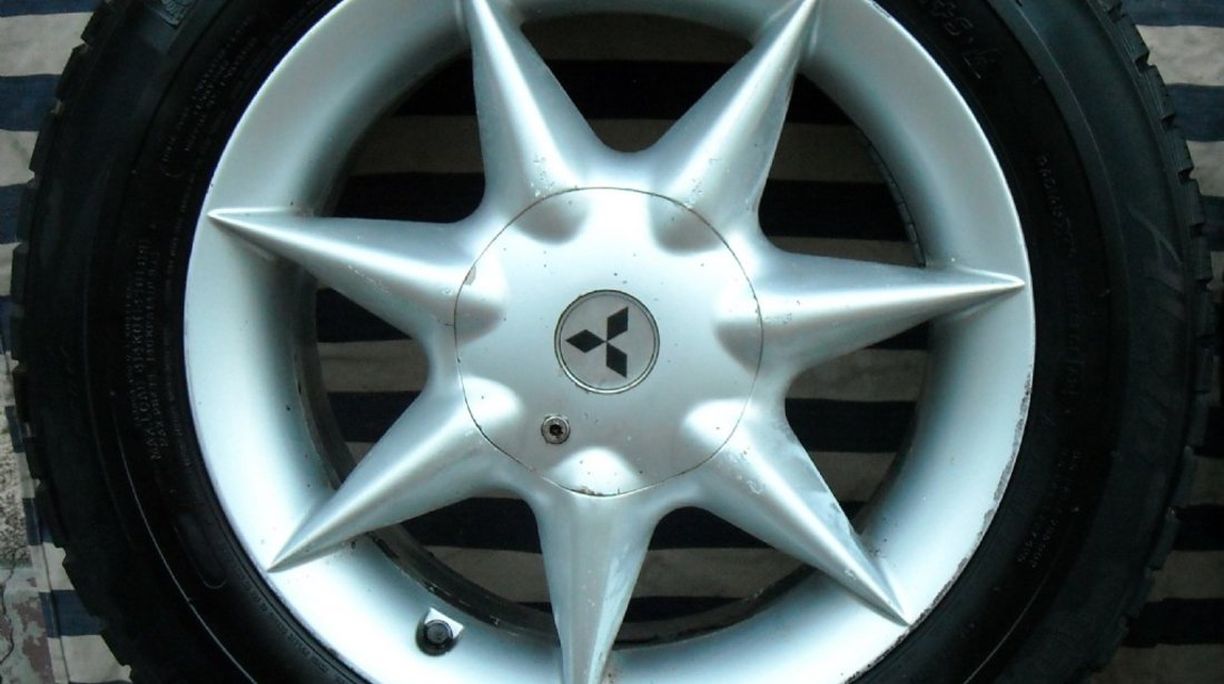 JANTE aliaj pe 15 originale MITSUBISHI cu anvelope iarna MICHELIN Neg