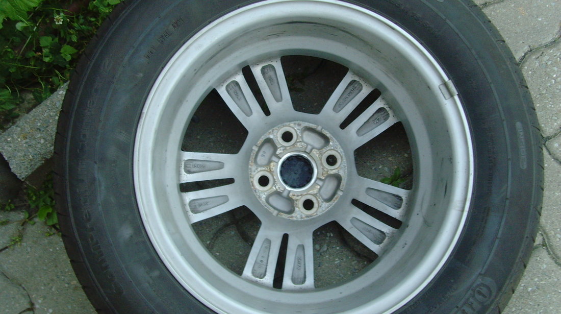 Jante de aliaj ca Noi 4x100 pe 15 originale Chevrolet Aveo T300 din2012+anvelope vara 195/65R15