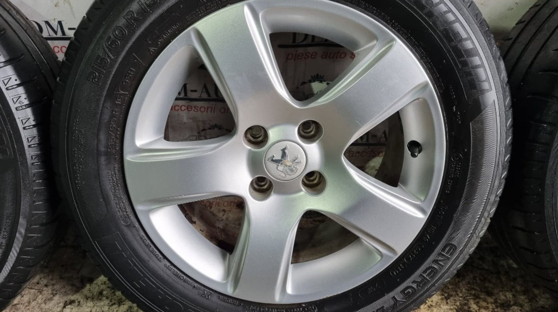 Jante originale cu anvelope vara R16 4x108 Peugeot 208 cod : 9684880380