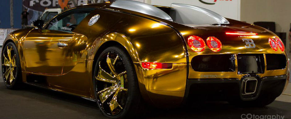 Kitsch sau extravaganta: Bugatti Veyron cu folie aurie si jante custom