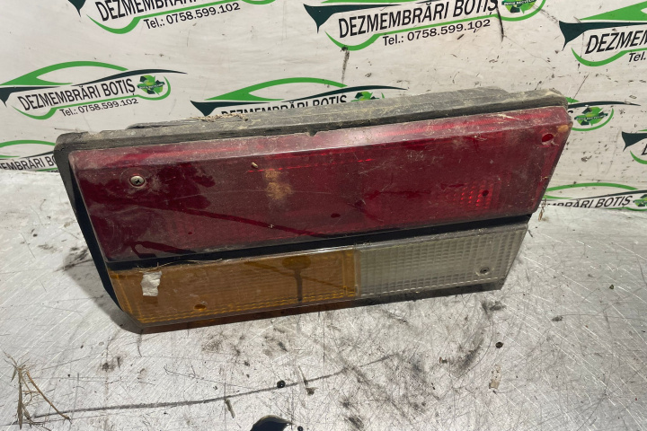 Lampa / Tripla stop stanga pe aripa Dacia 1310 [1979 - 2004] Sedan