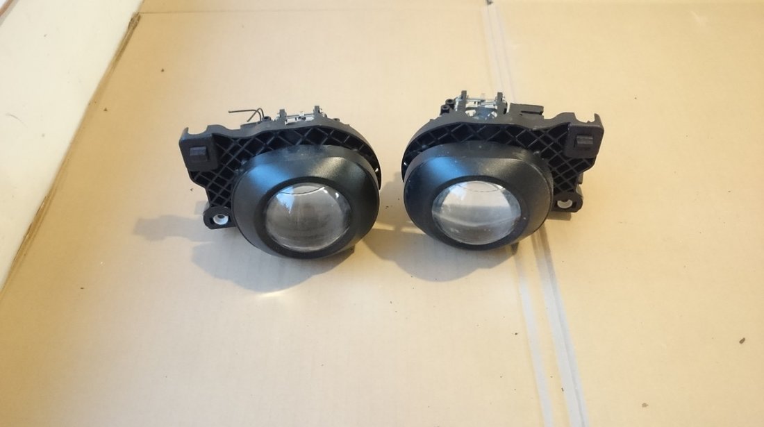 Lupe far Xenon BMW E90 E91 Facelift cod 6553150000, 6553250000