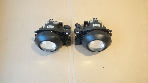 Lupe far Xenon BMW E90 E91 Facelift cod 6553150000, 6553250000