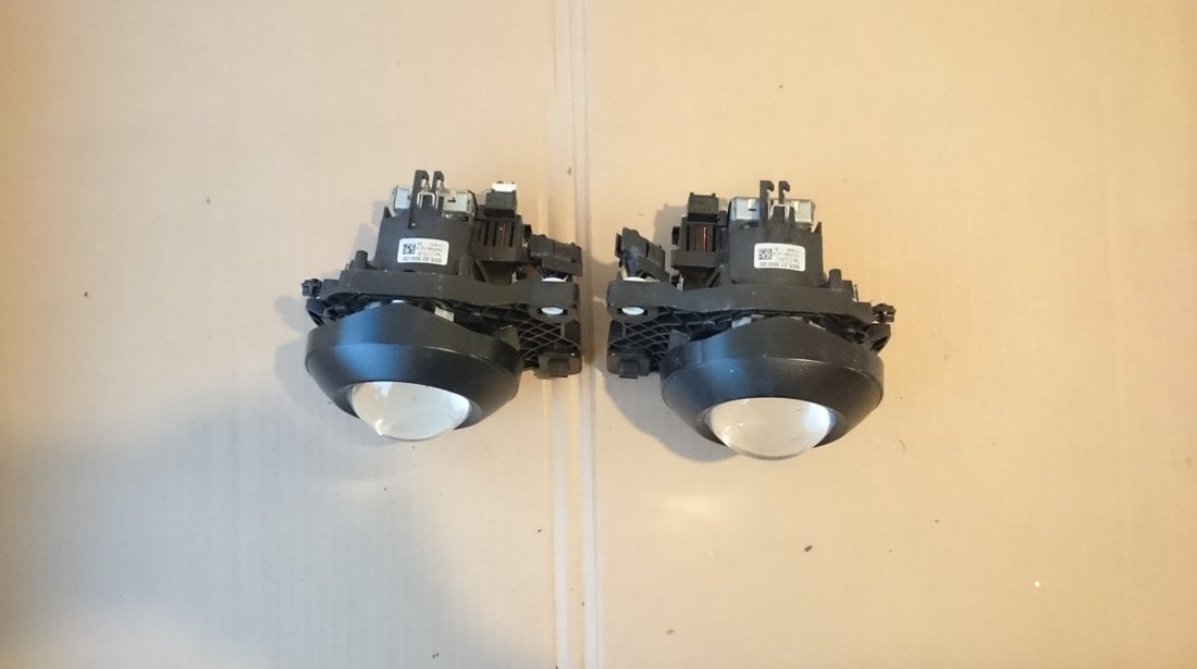 Lupe far Xenon BMW E90 E91 Facelift cod 6553150000, 6553250000