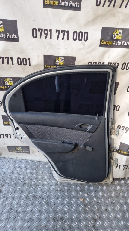 Macara geam usa stanga spate manuala Chevrolet Aveo 1.2 benzina