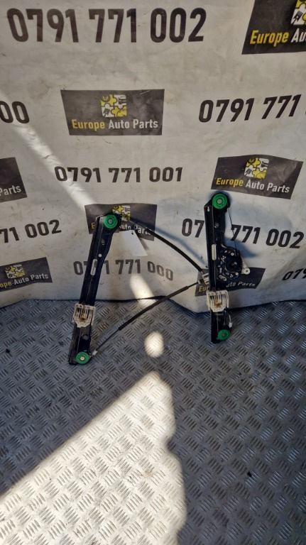 Macara usa stanga fata BMW seria 1 E87 E81 2.0 D an 2011