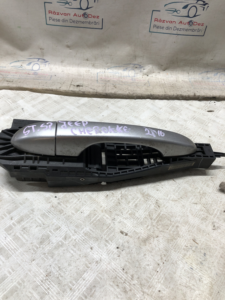 Maner exterior stanga spate Jeep Cheroke