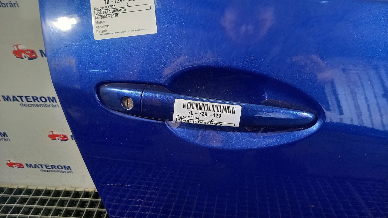 MANER USA FATA DREAPTA MAZDA 2 2 - - (2007 2010)