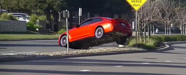 Momentul in care un BMW M4 loveste o bordura si... zboara