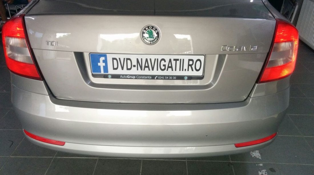 NAVIGATIE DEDICATA SKODA OCTAVIA 2 XTRONS PF710TSS MENIURI OEM DVD GPS CARKIT FARA RAMA ADAPTOARE!