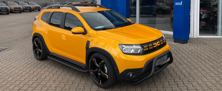 Nemtii au pus o Dacie Duster pe burta si i-au dat un set de jante cu diametrul de 20 de inch. Acum cauta un cumparator caruia sa i-o vanda cu pretul de 33.990 de euro Nemtii au pus o Dacie Duster pe burta si i-au dat un set de jante cu diametrul de 20 de inch. Acum cauta un cumparator caruia sa i-o vanda cu pretul de 33.990 de euro