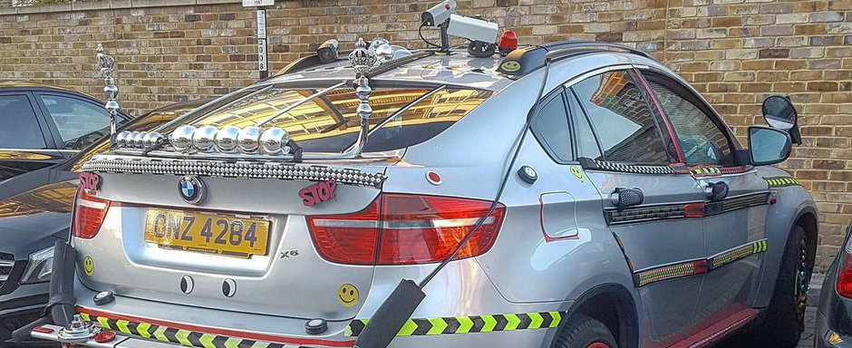 Nimeni nu stie ce-a fost in capul lui. Englezul asta si-a impodobit BMW-ul cu tot ce-a gasit prin casa Nimeni nu stie ce-a fost in capul lui. Englezul asta si-a impodobit BMW-ul cu tot ce-a gasit prin casa