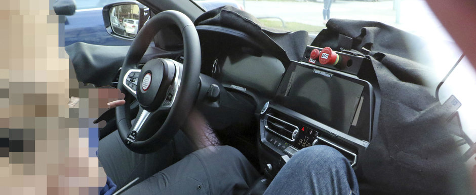 Noua masina de la BMW a fost surprinsa cu interiorul la vedere. Daca peisajul ti se pare familiar... Noua masina de la BMW a fost surprinsa cu interiorul la vedere. Daca peisajul ti se pare familiar...