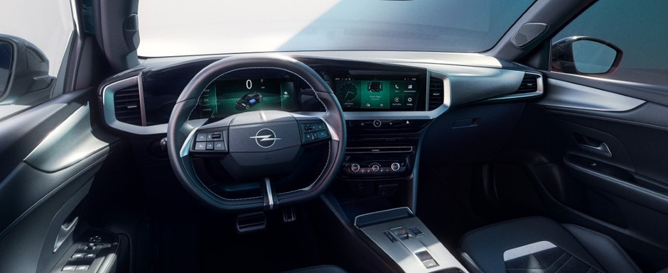 Noua masina de la Opel a ajuns si in Romania. Cea mai ieftina versiune costa 22.300 de euro si vine cu doua ecrane in bord Noua masina de la Opel a ajuns si in Romania. Cea mai ieftina versiune costa 22.300 de euro si vine cu doua ecrane in bord