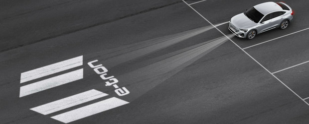 Noua masina de serie de la Audi are faruri care proiecteaza animatii pe asfalt. VIDEO ca sa te convingi si singur