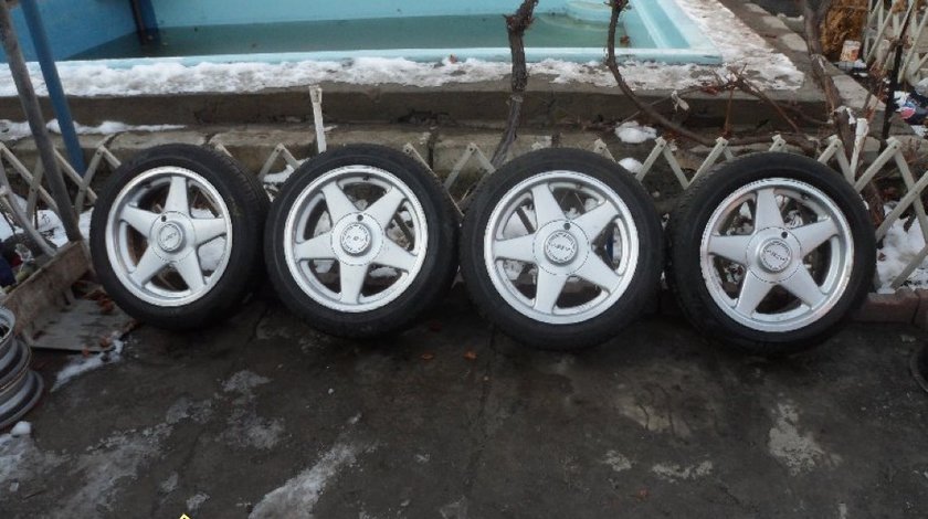 Ocazie set de 4 jante de aliaj pe 16 cu 4 gaurii 4x114 3 marca AZEW cu tot cu cauciucurii de vara 205 50 16 la doar 250 euroo