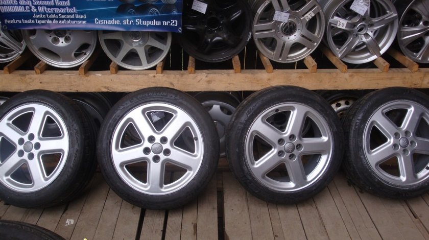 Ocazie set de 4 jante de aliaj pe 18 originale AUDi A6 A8 merg si pe A4 cu tot cu anvelope de vara marimea 245 45 R18 la doar 400 EURO