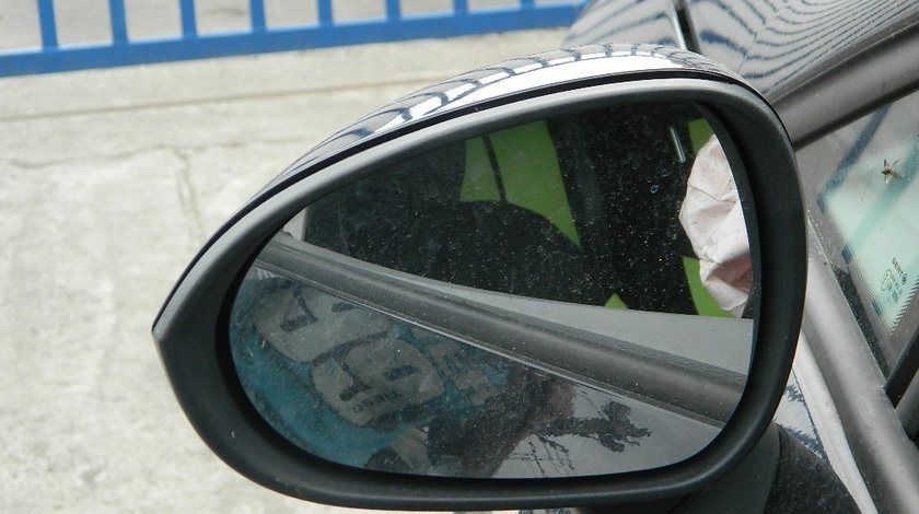 Oglinda stanga Seat Ibiza model 2011
