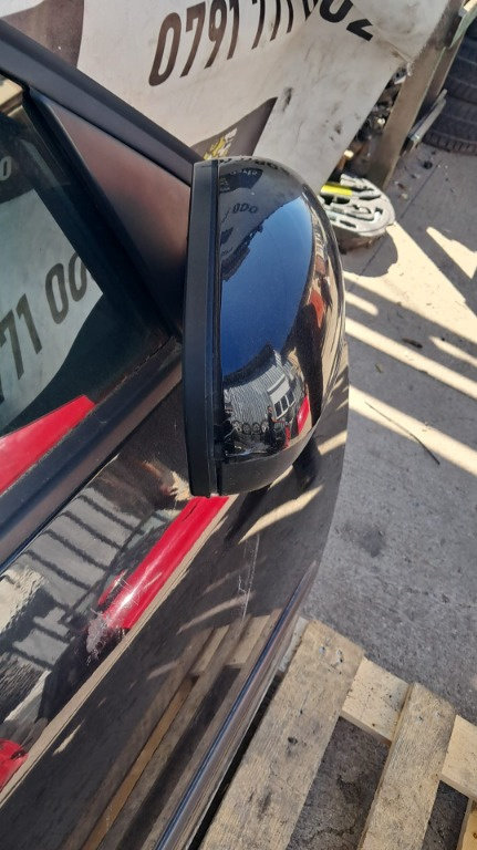 Oglinda usa dreapta fata Skoda Roomster an 2012