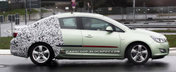 Noi imagini spion cu viitorul Opel Astra sedan